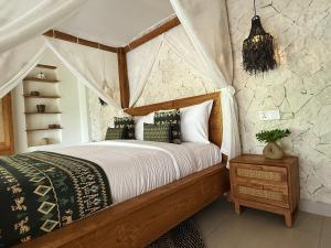 Letto o letti in una camera di ARYA Sumba Resort - Kodi