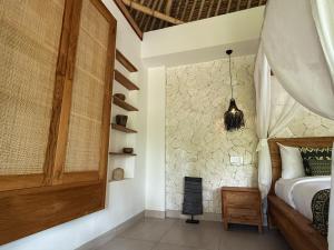 Letto o letti in una camera di ARYA Sumba Resort - Kodi