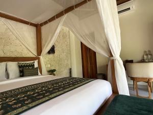 Letto o letti in una camera di ARYA Sumba Resort - Kodi
