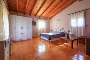 Katil atau katil-katil dalam bilik di Harmony Country House