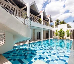 Bazén v ubytování Winds Boutique Hotel nebo v jeho okolí