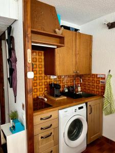 Kuchyň nebo kuchyňský kout v ubytování Appartement 4 couchages avec terrasse