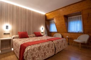 Voodi või voodid majutusasutuse Hotel Eth Solan & SPA toas
