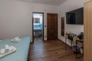 Kuchyň nebo kuchyňský kout v ubytování Vatican Design Suites