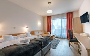 TV a/nebo společenská místnost v ubytování Hotel U Kozicky