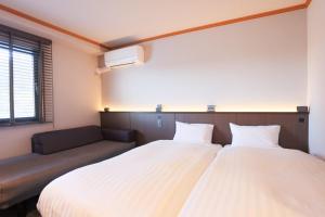 Letto o letti in una camera di Hotel Castle Inn Ise