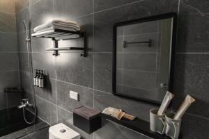 Kúpeľňa v ubytovaní Yuzhi Wenlv B&B