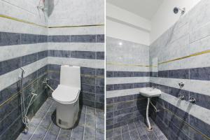 Ένα μπάνιο στο FabExpress Awadh Inn - 400m from Shri Ram Janam Bhumi