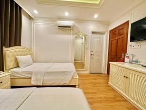 Postel nebo postele na pokoji v ubytování Maya Hotel 2