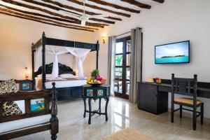 Un televizor și/sau centru de divertisment la Next Paradise Boutique Resort