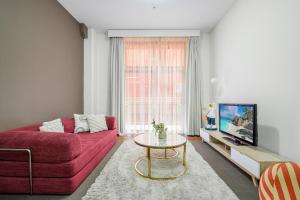 Μια τηλεόραση ή/και κέντρο ψυχαγωγίας στο Sydney CBD 1Br 4ppl with Pool Spa Gym Fireworks