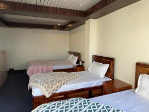 Postel nebo postele na pokoji v ubytování Hotel Basera
