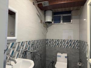 Koupelna v ubytování Hotel Basera