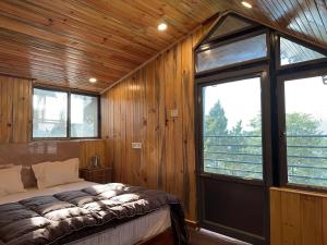 Postel nebo postele na pokoji v ubytování Hotel Basera