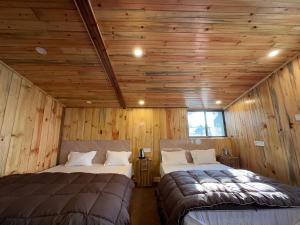 Postel nebo postele na pokoji v ubytování Hotel Basera