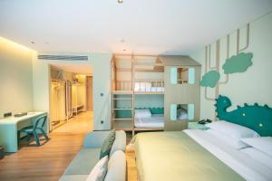 Voodi või voodid majutusasutuse Chaozhou Yuyu Hotel toas
