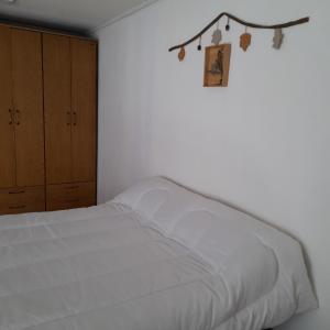 Ένα ή περισσότερα κρεβάτια σε δωμάτιο στο Habitacion con baño en Sweet