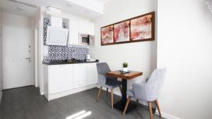 Kuchyň nebo kuchyňský kout v ubytování Excellent Apartments Galata
