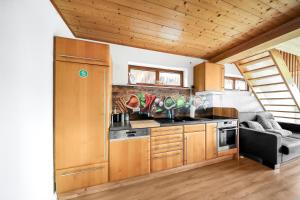 Kuchyň nebo kuchyňský kout v ubytování Apartment Robin