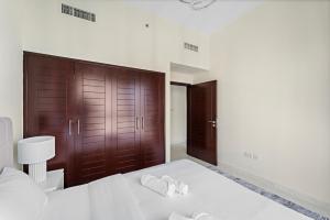Postel nebo postele na pokoji v ubytování Boulevard Central 2 by Luxstay Holiday Homes