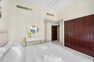 Postel nebo postele na pokoji v ubytování Boulevard Central 2 by Luxstay Holiday Homes
