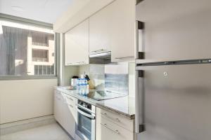 Kuchyň nebo kuchyňský kout v ubytování Boulevard Central 2 by Luxstay Holiday Homes