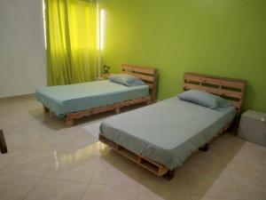 Letto o letti in una camera di Meeting Point- Tarrafal Center, also in Praia & Fogo-NO CASH ACCEPTED