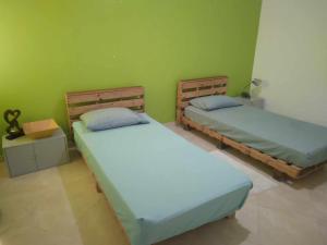 Letto o letti in una camera di Meeting Point- Tarrafal Center, also in Praia & Fogo-NO CASH ACCEPTED