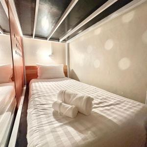 Postel nebo postele na pokoji v ubytování Yoi Hotel krabi