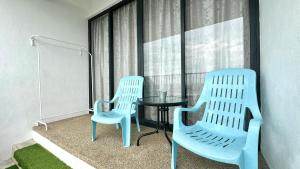LM HomeyC 3BR Family Suite for 4-14 Pax with Nexflix & Coway Water Purifier的休息区