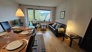 Khu vực ghế ngồi tại Ferienwohnung in zentraler und ruhiger Lage mit Balkon, fußläufig zur Innenstadt