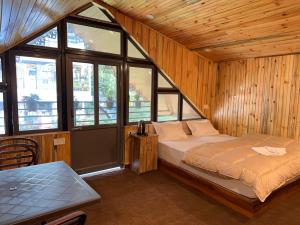 Postel nebo postele na pokoji v ubytování Hotel Basera