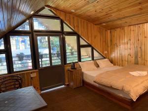 Postel nebo postele na pokoji v ubytování Hotel Basera