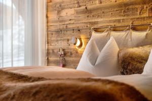 Uma cama ou camas num quarto em K Lodge Mountain