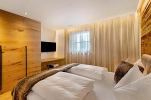 Uma cama ou camas num quarto em K Lodge Mountain