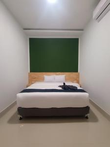 Voodi või voodid majutusasutuse D'Hills Hotel toas