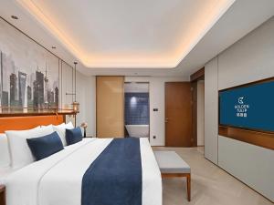 Postel nebo postele na pokoji v ubytování Shanghai Hongqiao Yankuang Tulip Hotel
