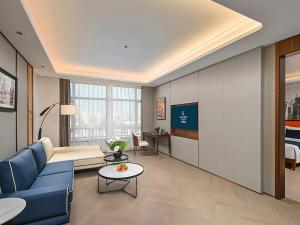Shanghai Hongqiao Yankuang Tulip Hotel的休息区