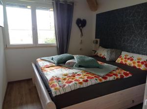 Postel nebo postele na pokoji v ubytování Haus Siebenschläfer