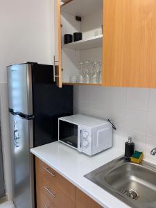 Photo de la galerie de l'établissement Apartamento T2 Equipado e Aconchegante., à Praia