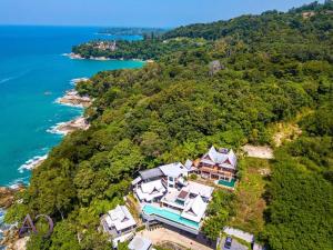 an aerial view of a house on an island at Villa Amara - Luxury Infinity Pool Villa with Sea view in Surin Beach