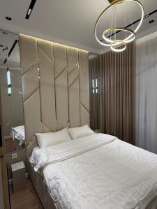 Postel nebo postele na pokoji v ubytování Apartment A