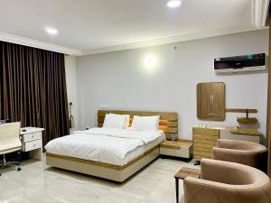 Postel nebo postele na pokoji v ubytování Coshelter Apartments