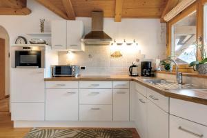 Kuchyňa alebo kuchynka v ubytovaní Ferienwohnung Thymian Thalerhof