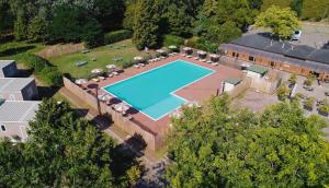 an overhead view of a swimming pool on a house at Club del Sole Bologna Easy Camping Village in Bologna