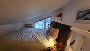 Ένα ή περισσότερα κρεβάτια σε δωμάτιο στο B21 Balcon de Venosc - 4 pers