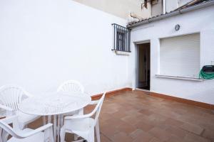 Balkón alebo terasa v ubytovaní Casa de pueblo con merendero y chimenea.