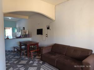 Μια τηλεόραση ή/και κέντρο ψυχαγωγίας στο Ampla casa com acesso ao Rio