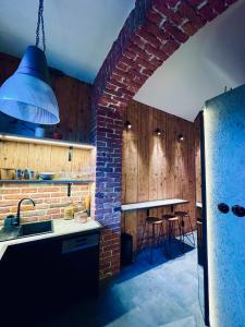 Kuchyň nebo kuchyňský kout v ubytování Art Design Apartment