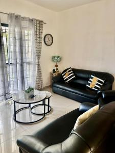 Coin salon dans l'établissement Sea La Vie Villa